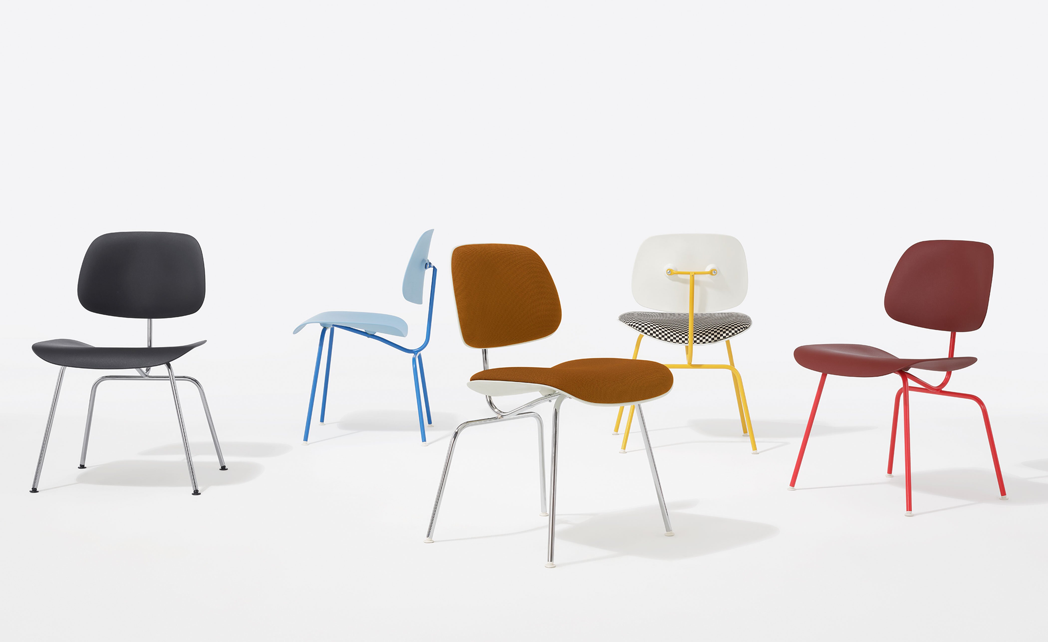 Eames Upholstered Molded Plastic Dining Chair Metal Base EC-127