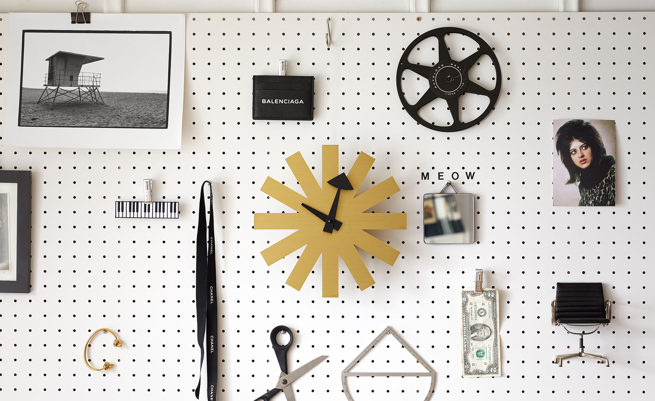 george nelson asterisk clock brass