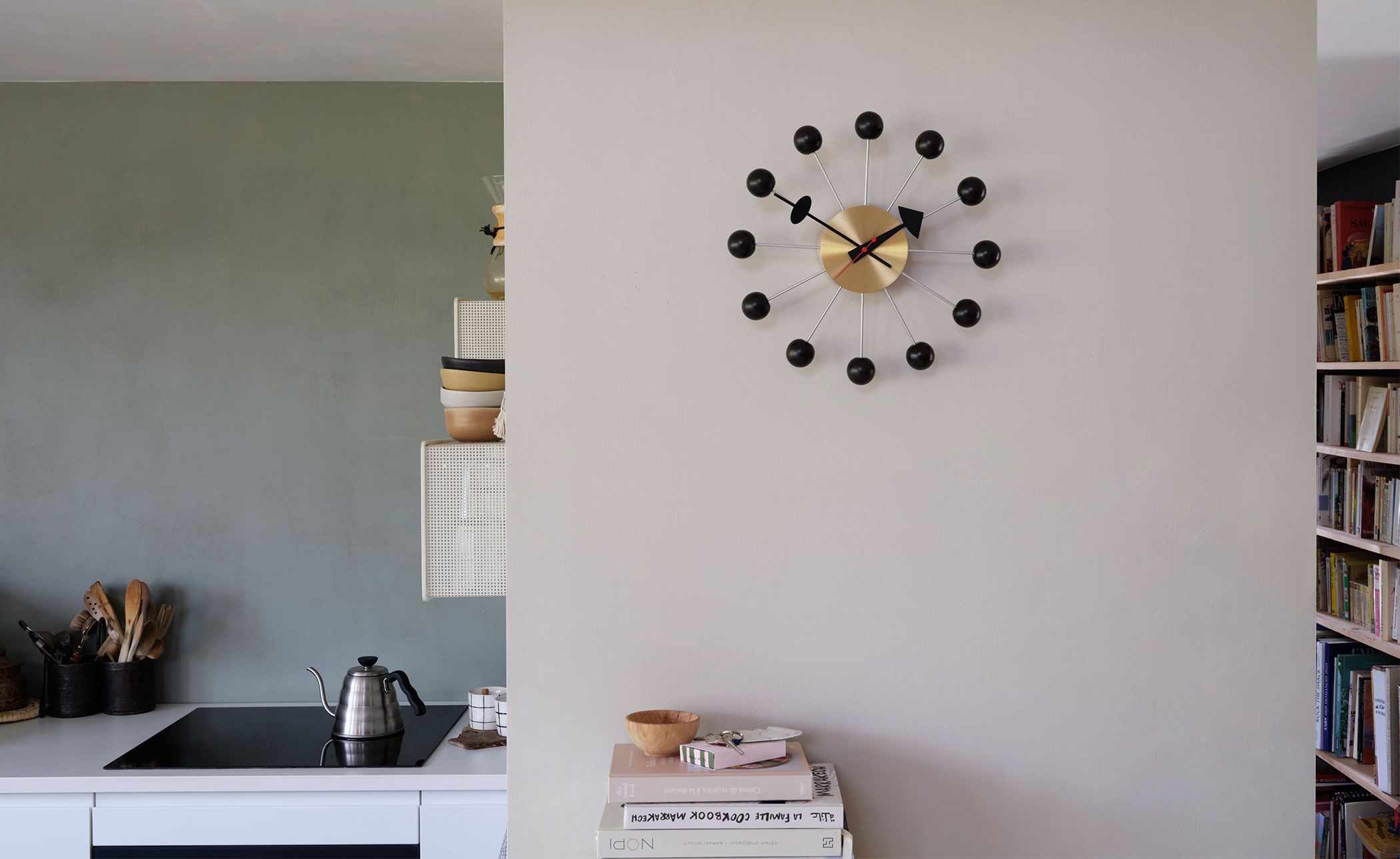 george nelson ball clock in black & brass